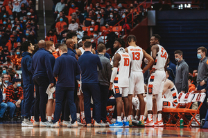 Our beat writers predict the Illini to dominate against Syracuse on Tuesday night.
